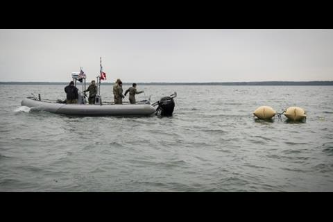 Deploying enclosed flotation bags in order to tow a World War II-era German Bottom-Mine (LMB) as part of mine countermeasure operations in the Baltic Sea (Photo: US Navy)